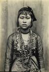 (PHILIPPINES) Binder containing 13 photographs depicting a variety of ethnographic portraits.